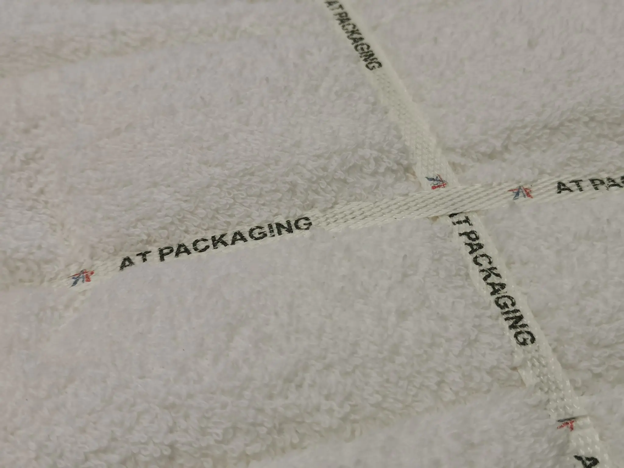 Stacked clean towels from industrial laundry processing
